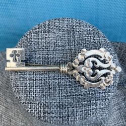 New Signed 925 Sterling Silver KEY Brooch.  Measures 3” X 1”.  Lovely Scroll Design, Authentic.