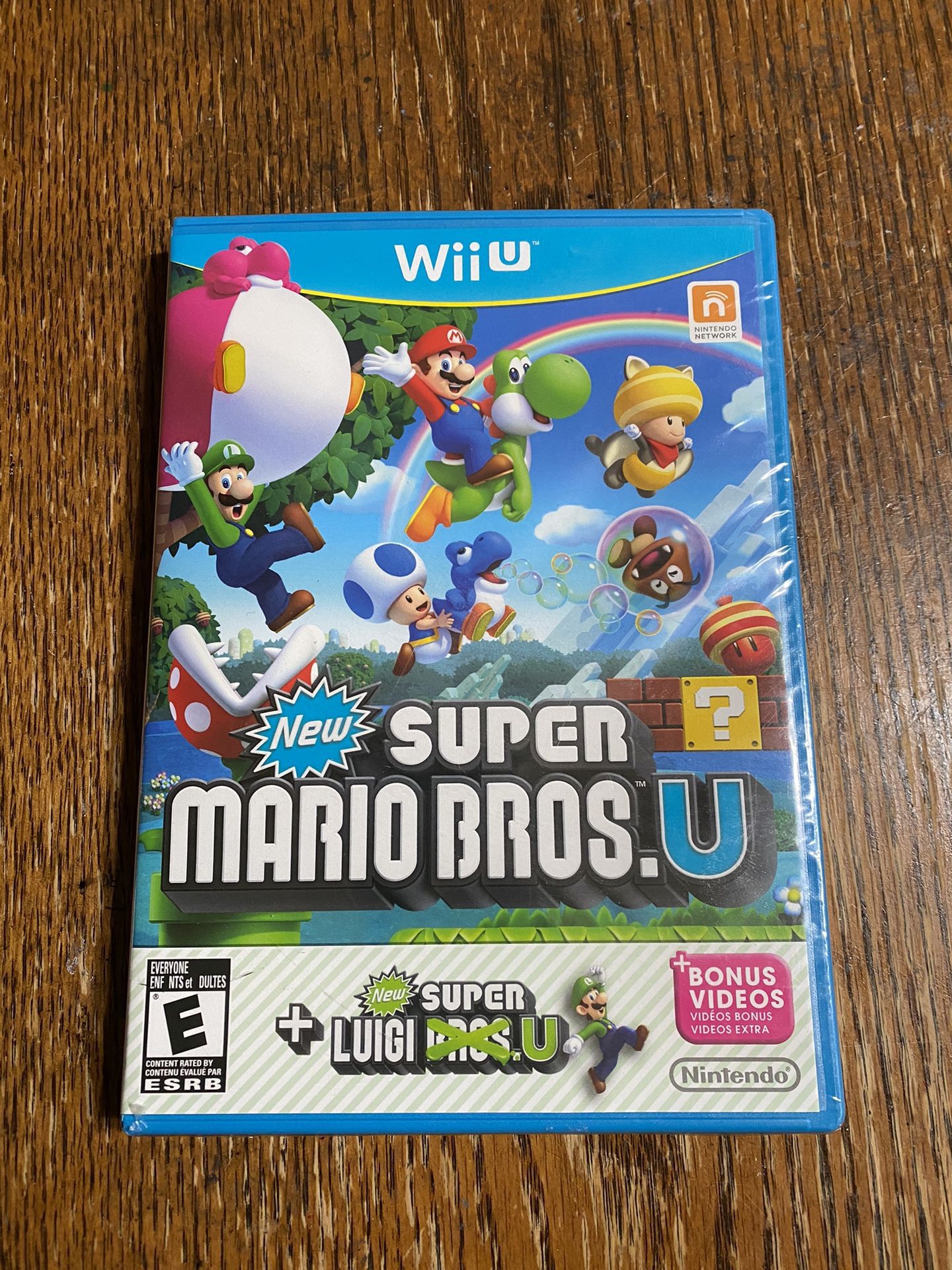 Wii U New Super Mario Bros U + New Super Luigi U.  Factory Sealed. ESRB Misprint Error