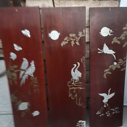 The print features bronzed leaves on a blue background on the right, balanced by young green shoots on a white background on the left.  Like new and p