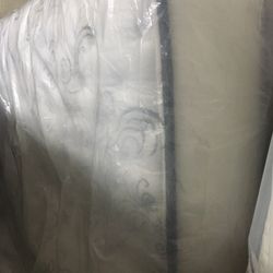 Queen mattress and box springs pillow top super thick new condition. 200