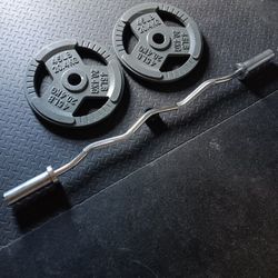 New 45lb Olympic Plates With 20lb Curl Bar
