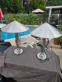 pair of modern chrome lamps