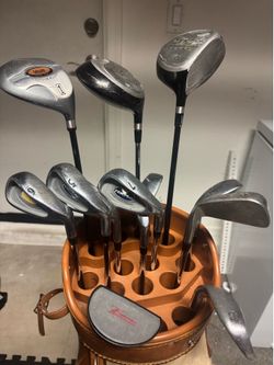 Assorted golf clubs for beginners