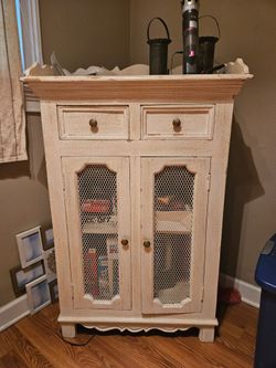 Distressed White Wood Cabinet with Mesh Doors