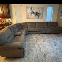 Beautiful, Gray elegant luxury, all electric powered large, plush sectional sofa