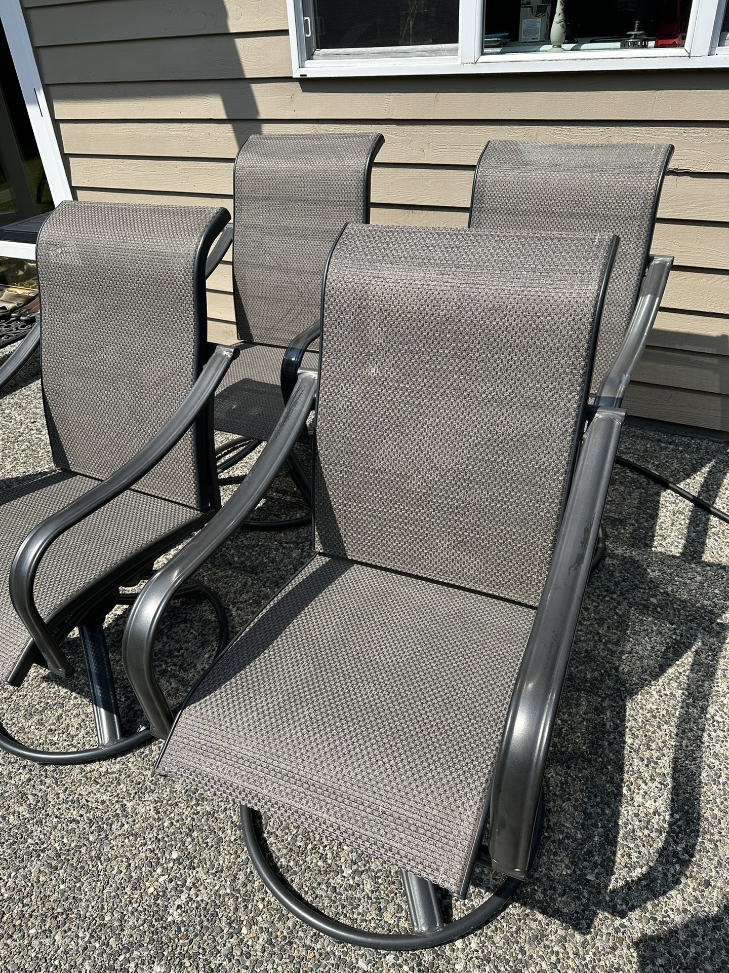 A Set Of Swivel Rocker Patio Chairs (4 Chairs)