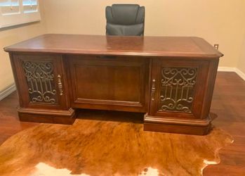 Gorgeous Executive Desk with decorative iron work by Ashley Furniture