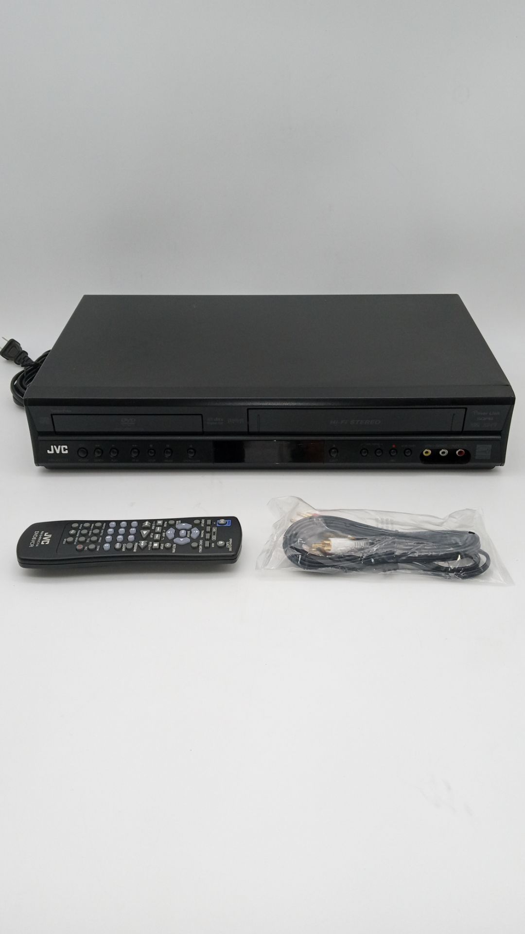 JVC VCR/DVD player with remote and cable. Works fine!