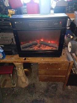 Appliance heater and simulated fire