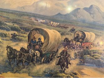 vintage print titled The Covered Wagon Train