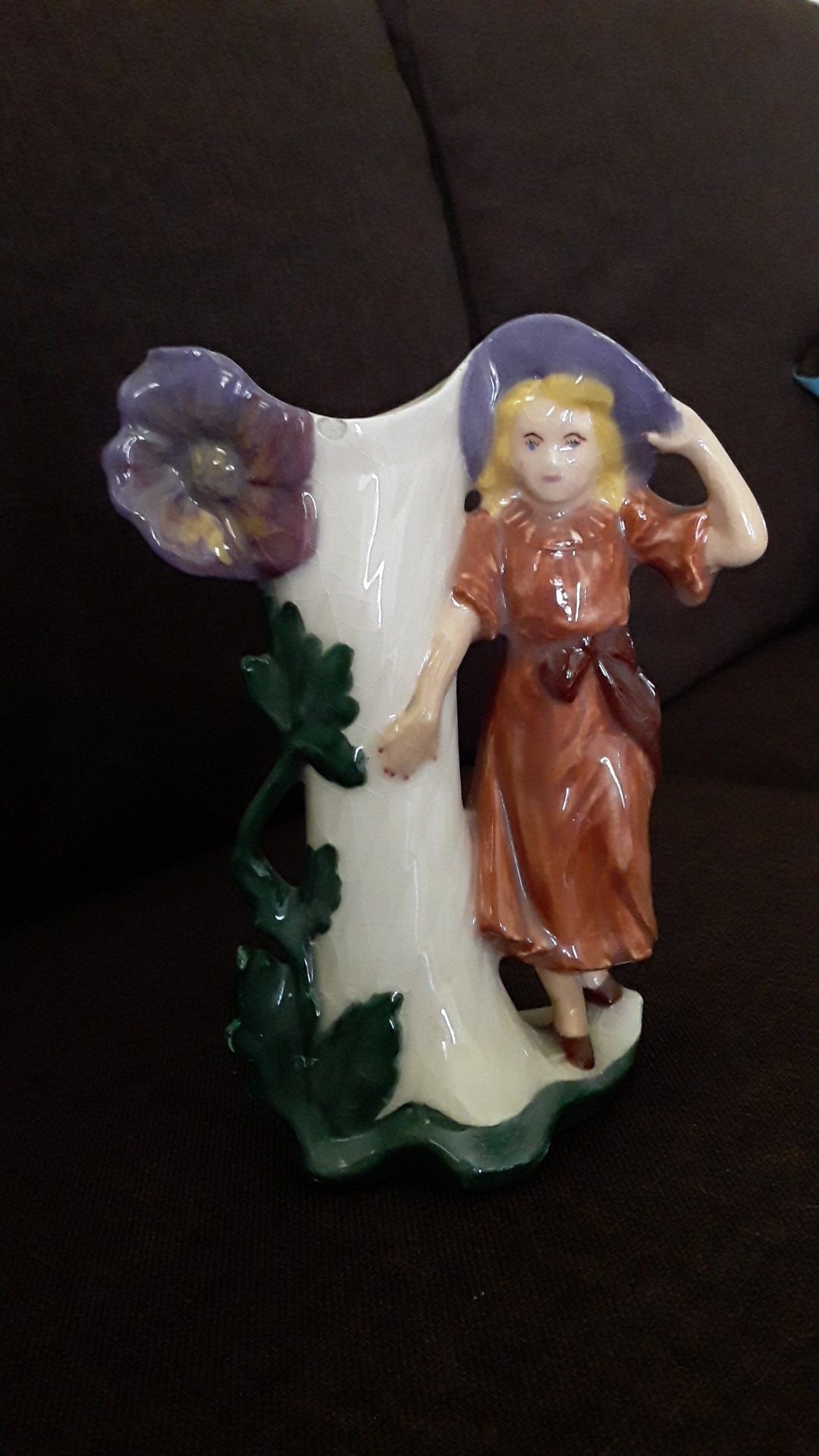 Vintage vase with a woman