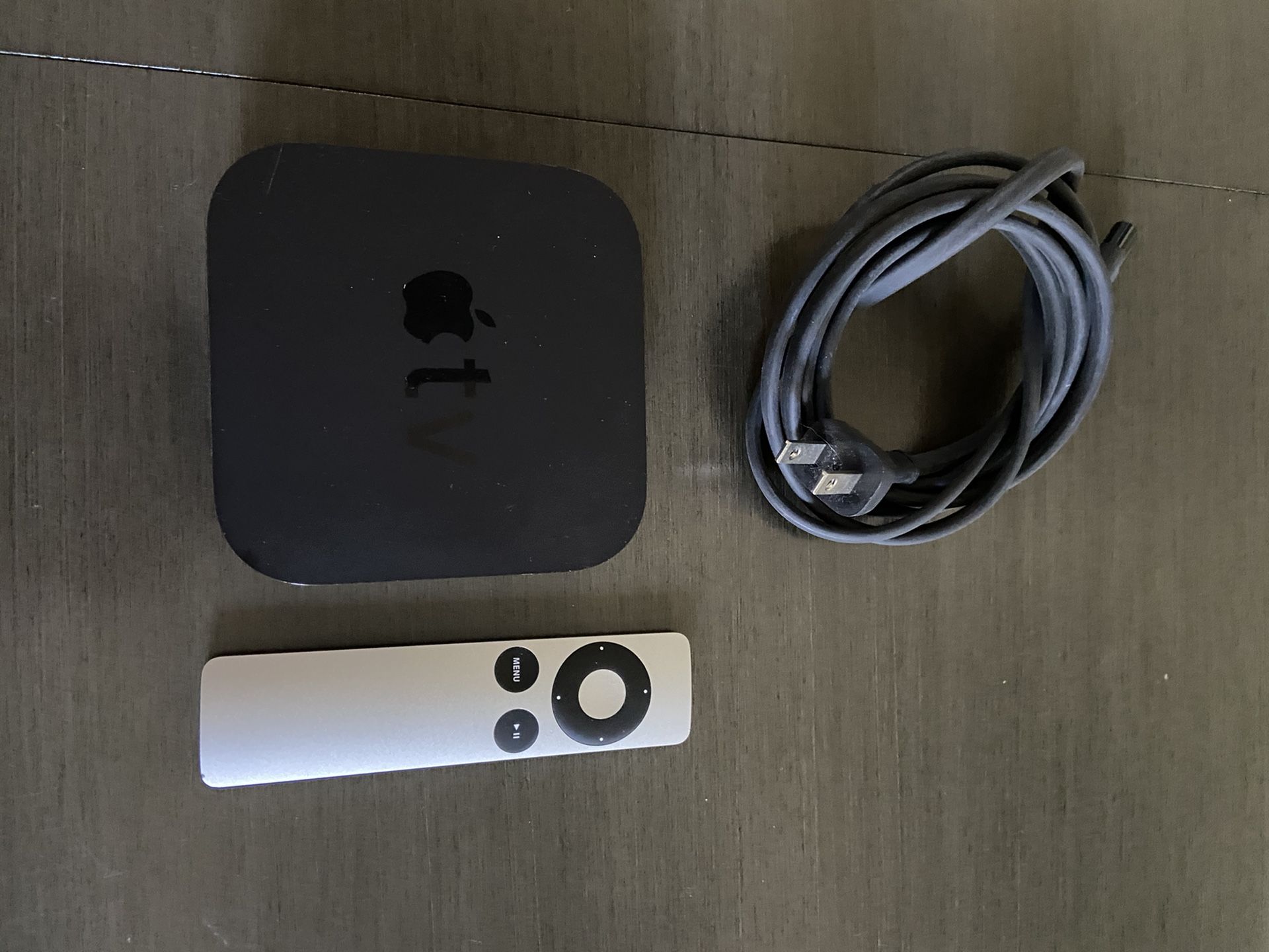 Apple TV. Not sure what version but it works as new