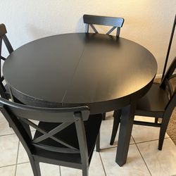Black Circular Expandable Kitchen Table with chairs