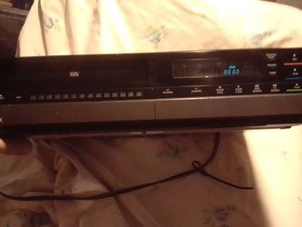 Magnavox VCR. Model# VR8525GYO1. Includes... Converter Box and Cables.