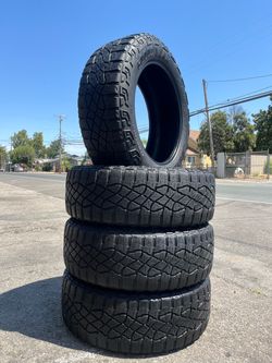 Goodyear wrangler territory M/T LT265/60/20”