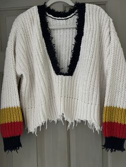 Wildfox- women's sneak out stripe Palmetto sweater and white with a deep V-neck and distressed edges