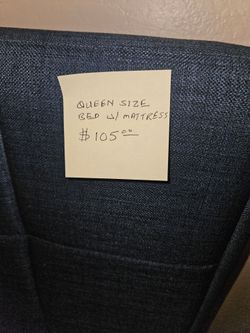 Queen size bed w/ mattress.