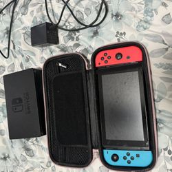 Nintendo Switch with Neon Blue and Neon Red Joy-Con