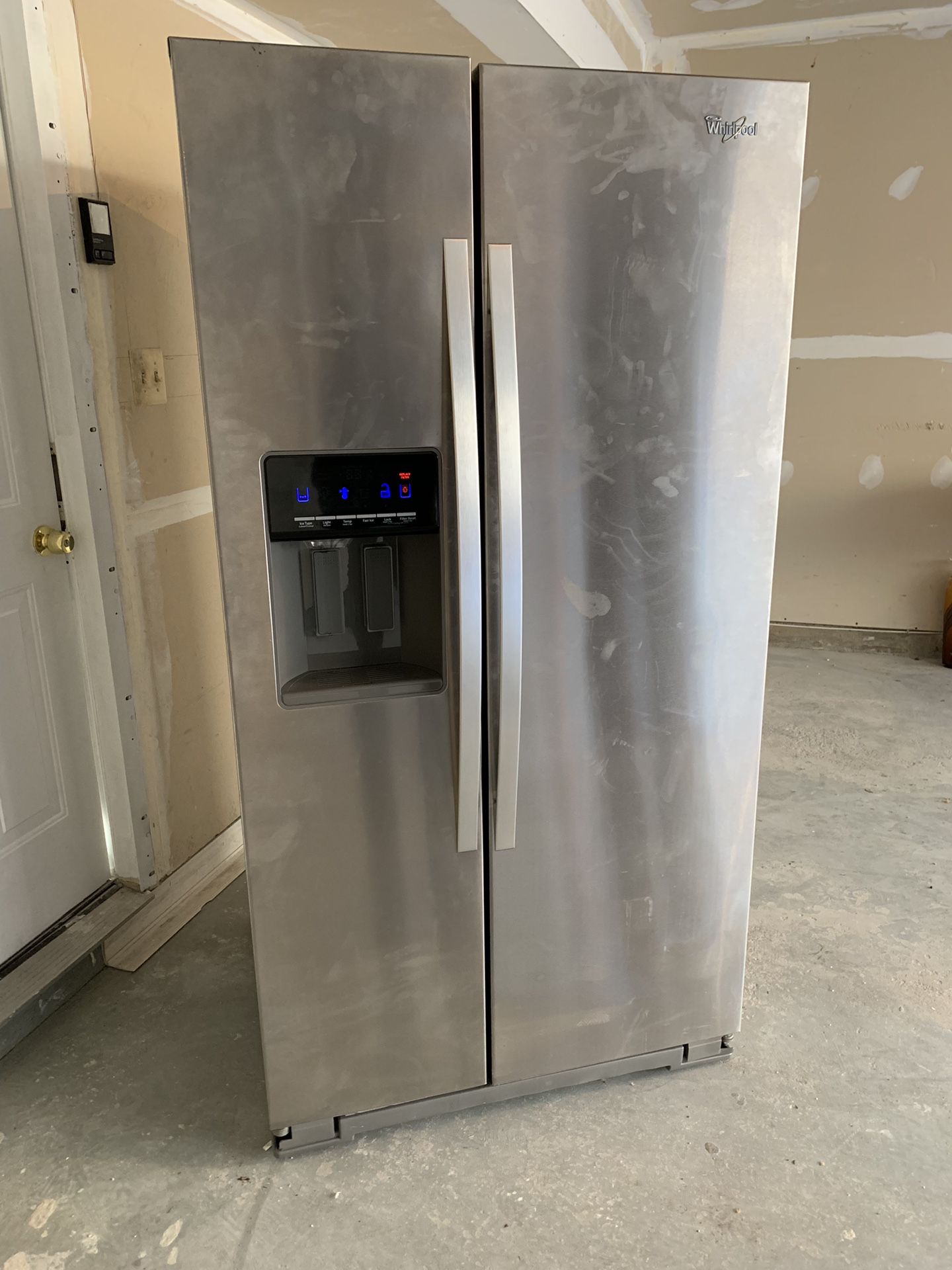 Stainless Steel Whirlpool Side-by-Side Refrigerator