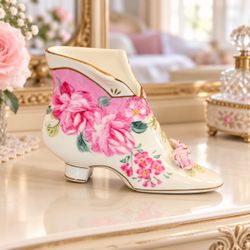 Beautiful decorative shoe-shaped vase by Formalities by Baum Bros. Pink floral design, raised roses, and gold-tone trim.