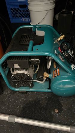 Makita air compressor like new firm price