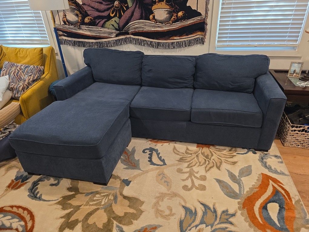 Living Spaces Couch and Ottoman