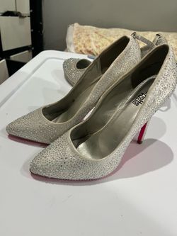 2 pairs of silver high heels