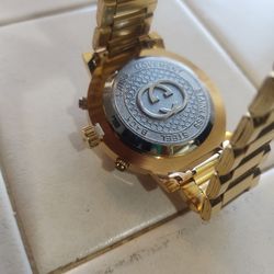 Gold-plated Gucci watch ⌚