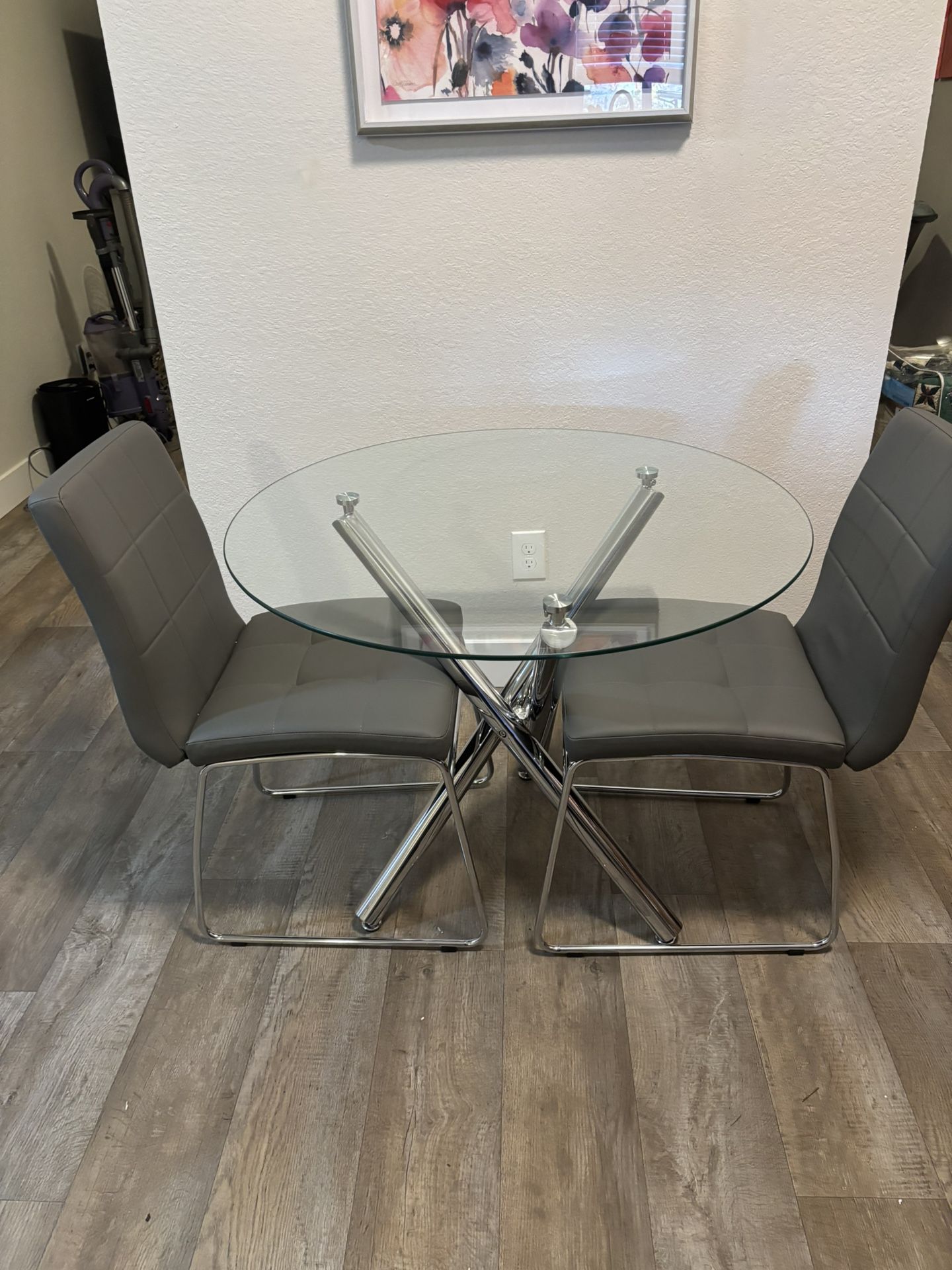 36” Glass & Chrome Table And 2 Padded Grey Chairs 