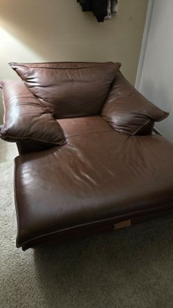 Brown leather chaise lounge