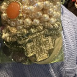 Vintage Jewelry In Mesh Bags A Couple Of Necklaces And A Couple Of Bracelets Maybe A Pendant 