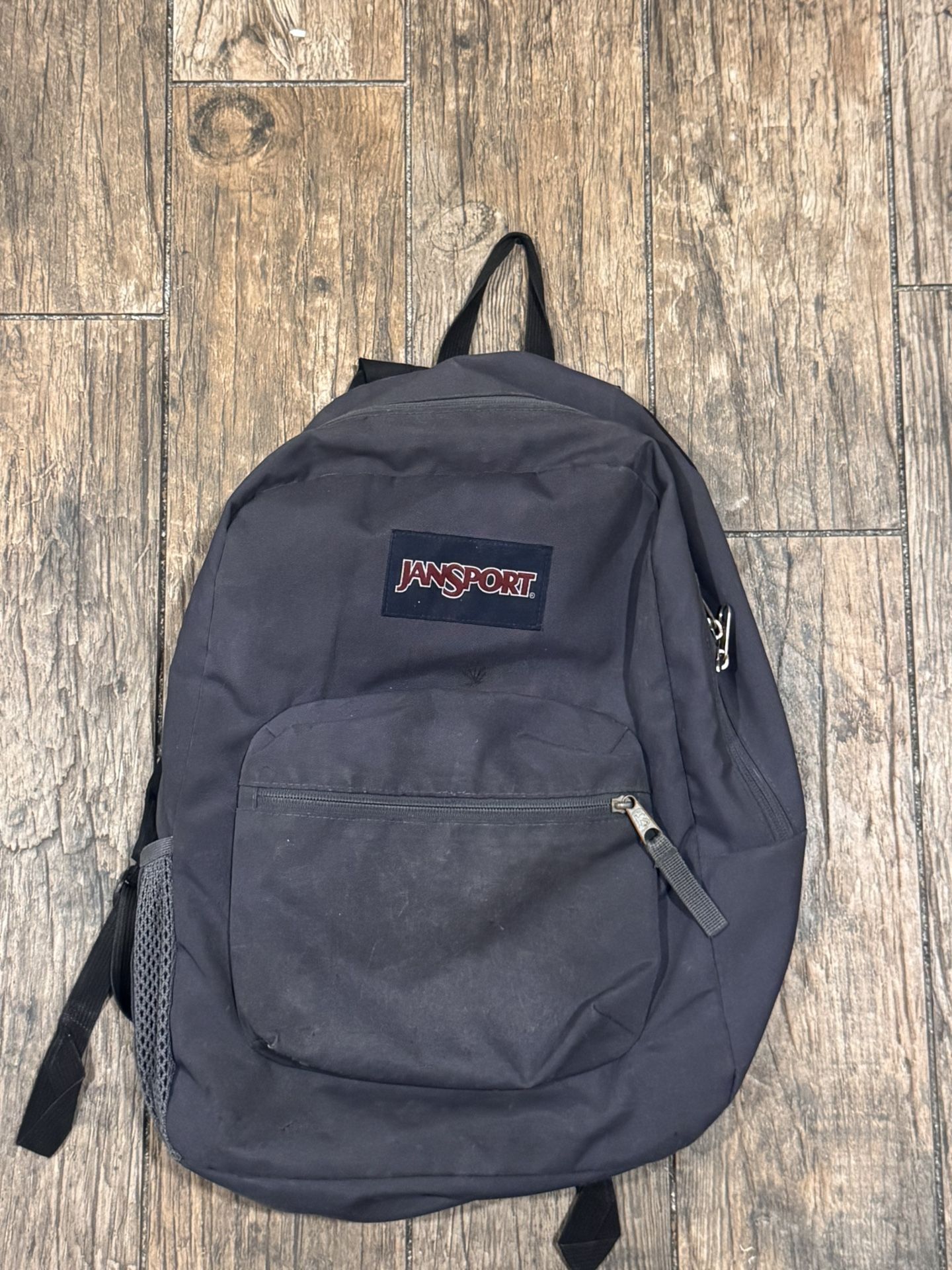 Grey Jansport backpack