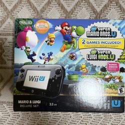 Super Mario Wii-U Deluxe Edition. CIB Comes With (12). Games. Mint. Great Collector Piece. Looking For Cash Or Trades. 