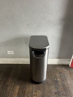 This is a simplehuman brushed stainless steel pet food storage container, specifically the 30-liter large size model.  Features a robust, lock-tight h