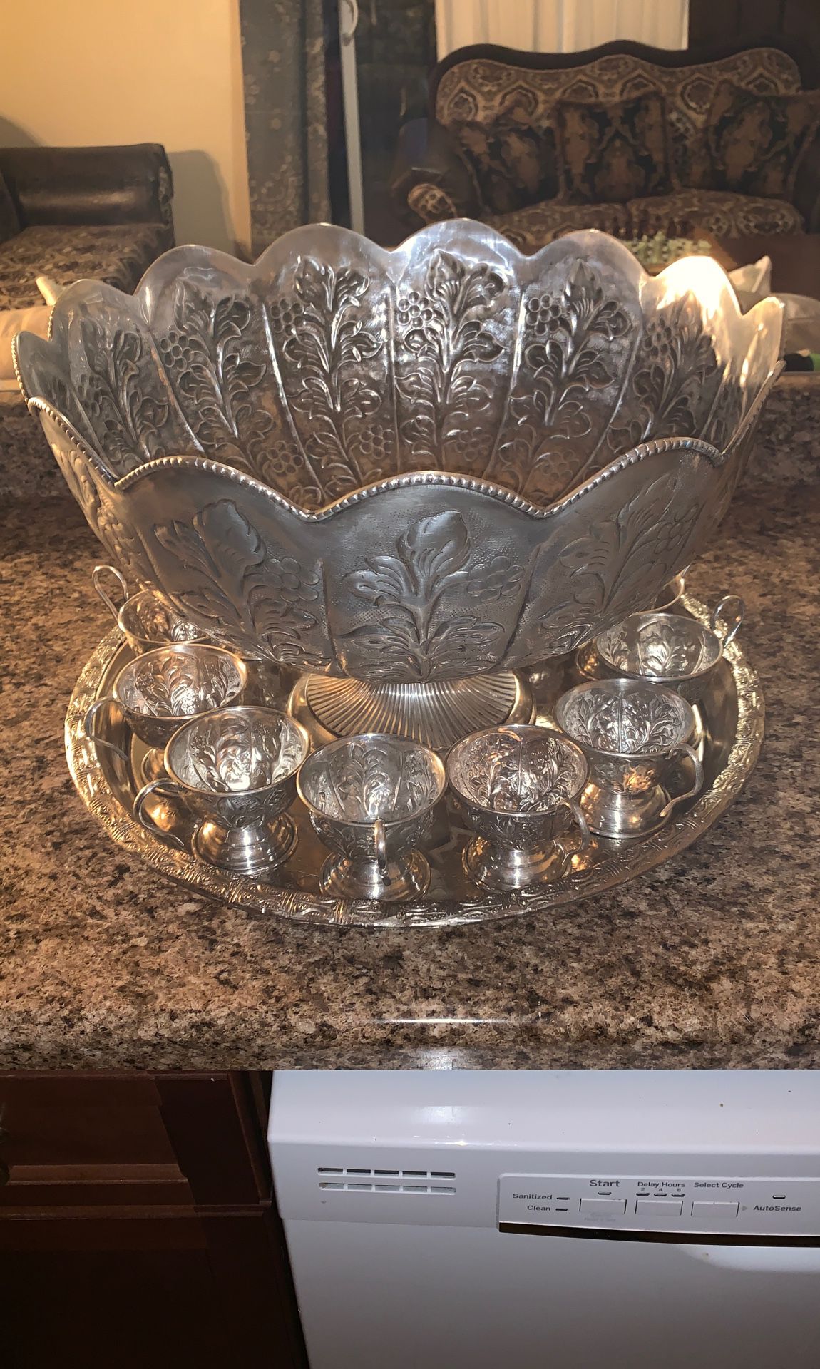 Antique silver plated punch bowl with 12 cups and plate