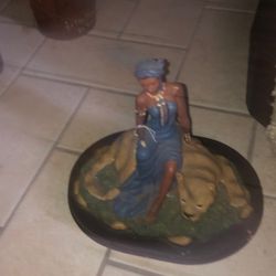 Figurine from “Ebony Visions" collection by Thomas Blackshear 