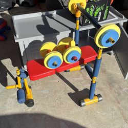 Kids weight bench with dumbbells
