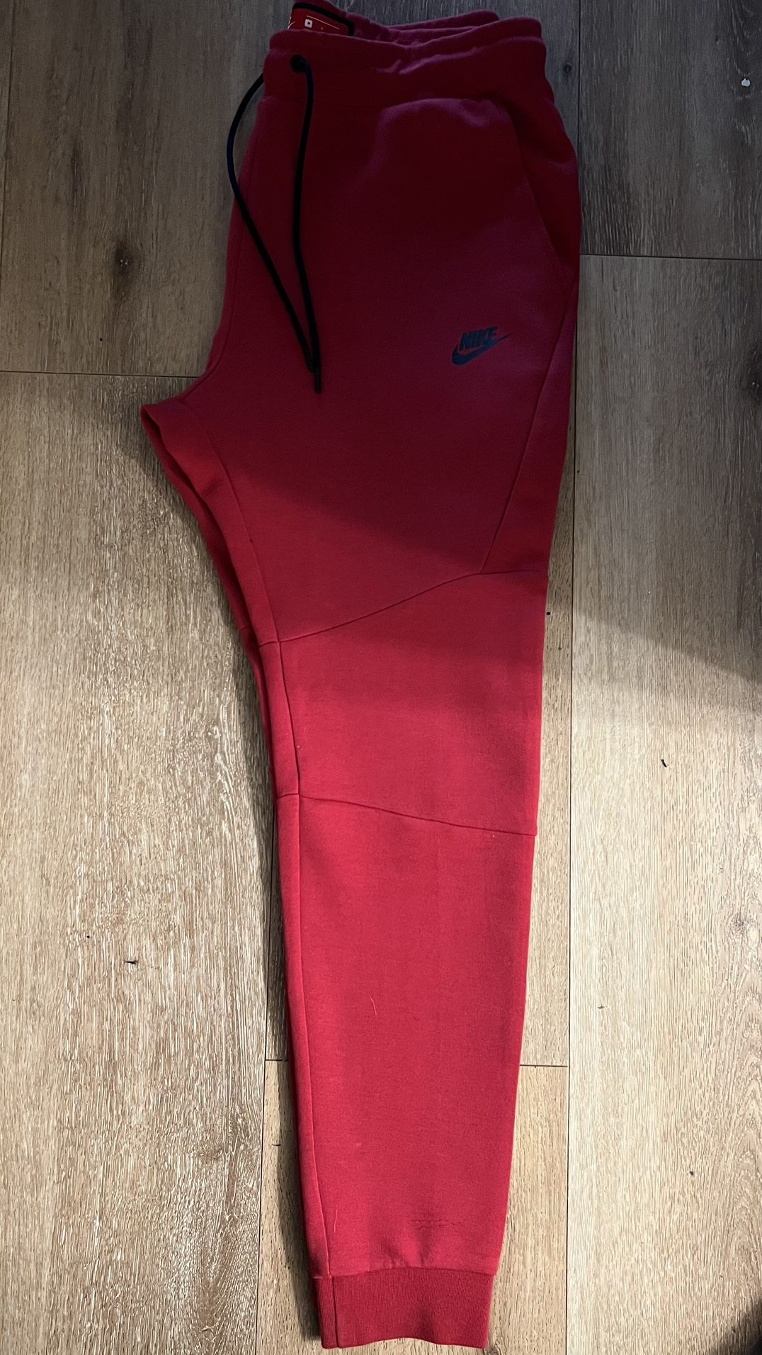 Red Nike Tech Bottoms