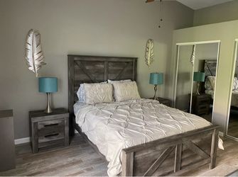 Rustic Gray Wood Queen Bed and Mattress only.