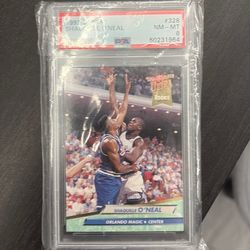 Shaquille O’Neal PSA eight rookie Zion PSA nine rookie