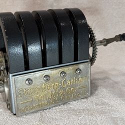 Antique telephone magneto manufactured by the Stromberg-Carlson Telephone Manufacturing Company.