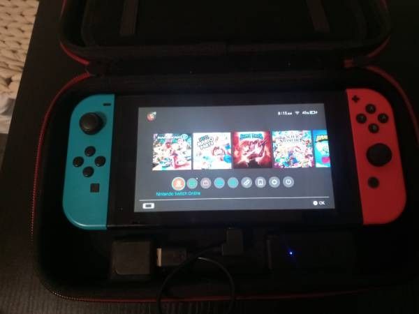 Nintendo Switch + Charging Case