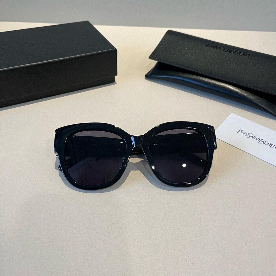 A pair of sunglasses of the same style