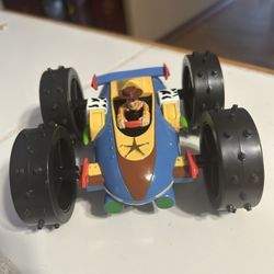 The item is a Disney Pixar Toy Story RC buggy toy featuring Woody.  It is an authentically licensed radio control car from the Toy Story movies.  The 