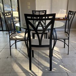 Glass top Wrought iron Table And 4 Chairs