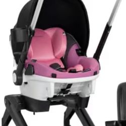 Car Seat And Stroller Evenflo Gold Shyft DualRide with Carryall Storage Infant Car Seat and Stroller Combo (Opal Pink)