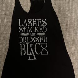 Large Lashes Stacked and Dressed In Black Tank