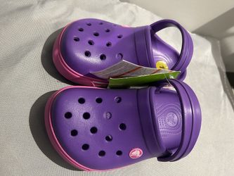 Authentic Crics Youth size 1 purple and magenta 
