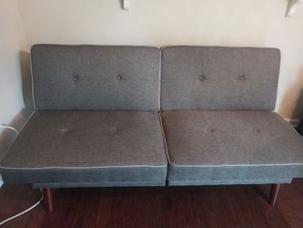 Gray Tufted Futon Sofa with -Child /tv stand - 32" Samsung tv