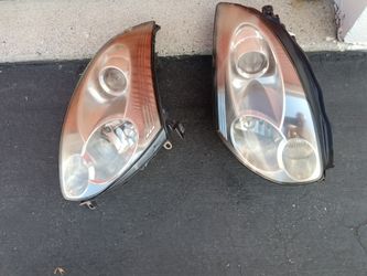 2004-2006 Infiniti G35 Coupe (2doors) Headlights Xenon With Light Bulbs And Accessories Oem.